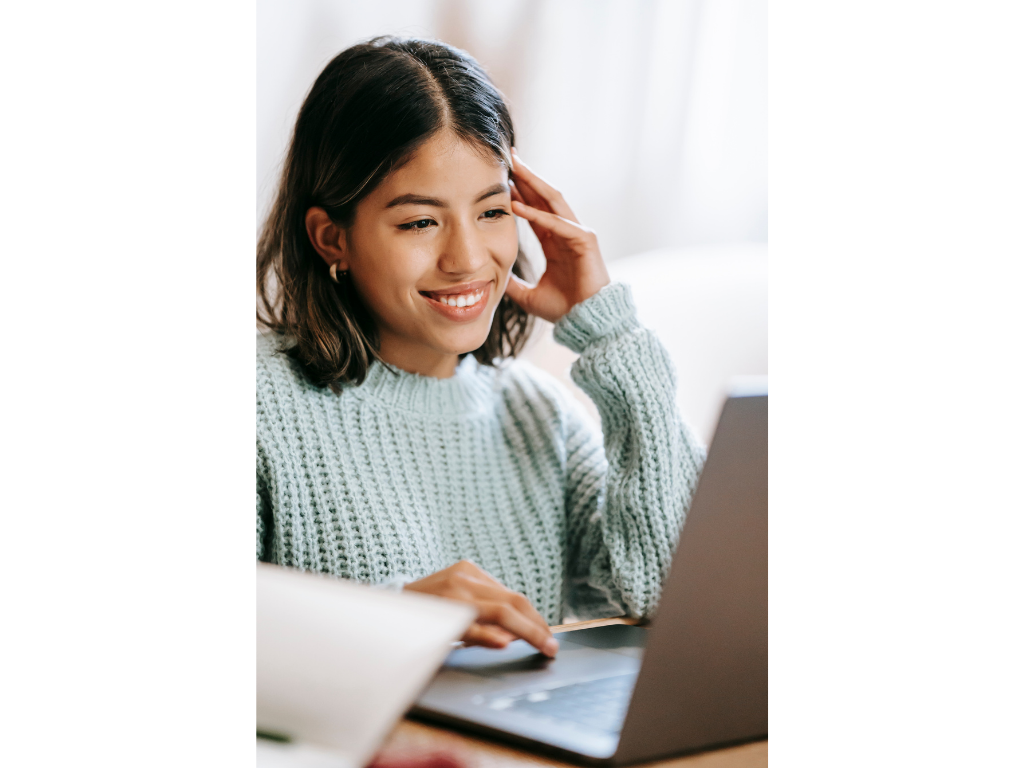 woman working on laptop, financial advisory firm, gaurik finserv